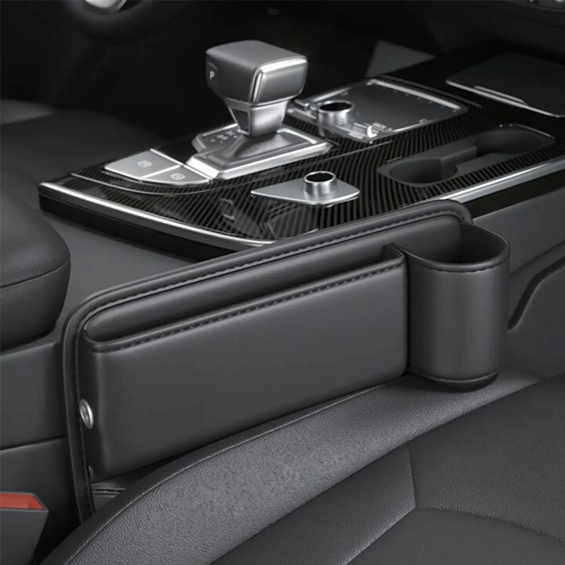 Leather seat-gap organiser beside a car gear shift