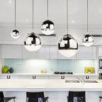 AuroraSphere Glass Orb Pendant Light With Silver Half And Clear Half