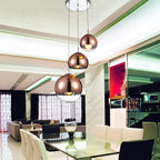 AuroraSphere Glass Orb Pendant Light With Silver Half And Clear Half