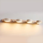 Indoor LED wall light designed with natural travertine and wood for warm architectural illumination - Euroselle