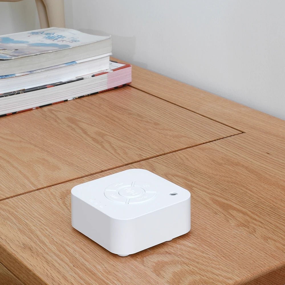 Machine à sons portable pour bébé LullMate – Rechargeable par USB, 10 sons apaisants intégrés, design compact pour les voyages