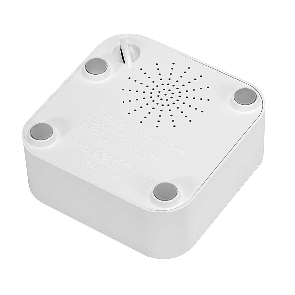 Machine à sons portable pour bébé LullMate – Rechargeable par USB, 10 sons apaisants intégrés, design compact pour les voyages