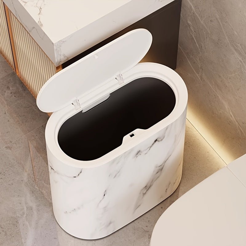Elegant oval marble-pattern waste bin designed for modern interiors with compact and stylish everyday functionality - Euroselle