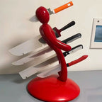 Artistic humanoid knife organizer with secure blade storage and space-saving countertop design for modern kitchen aesthetics - Euroselle