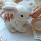 Animated plush bunny toy with realistic hopping, ear movement, and soft cuddly design for kids and playtime fun - Euroselle
