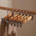 Solid Lotus Wood Hangers with Adjustable Metal Clips, 10 Pack - Euroselle
