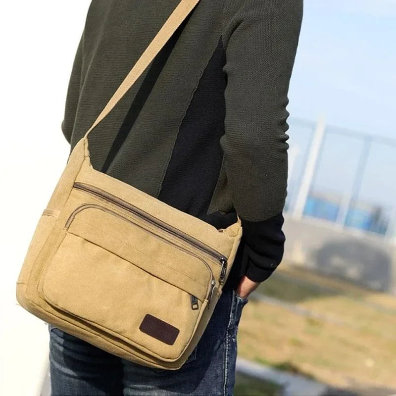 Bolso bandolera de lona — correa ajustable, bolsillos con cremallera