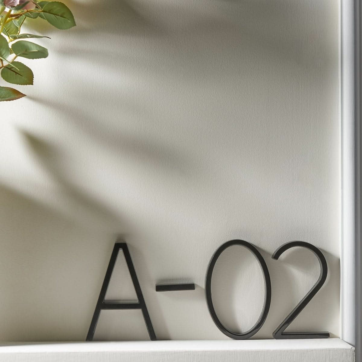 NexaHouse moderne 3D-svævende husnumre — ophøjet vægdisplay