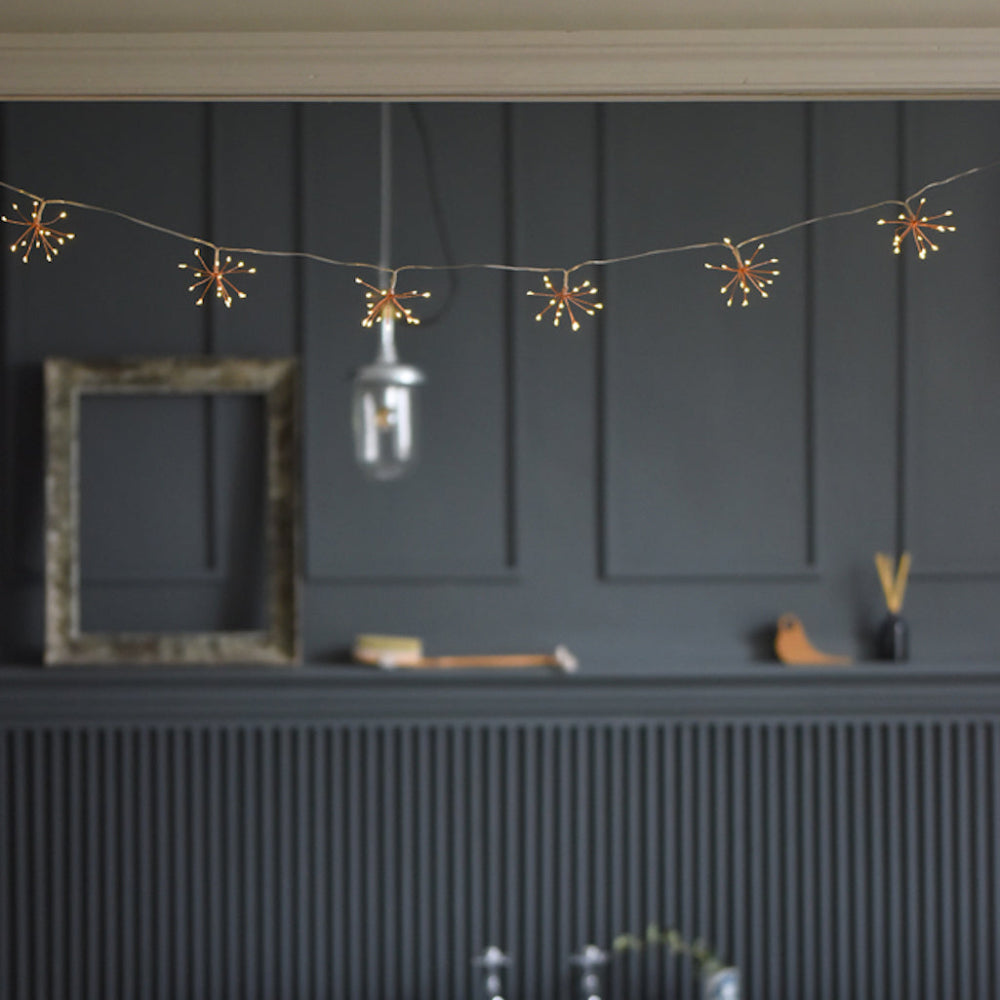 Luces decorativas de cobre con forma de estrella — LED de luz blanca cálida, a pilas y con enchufe