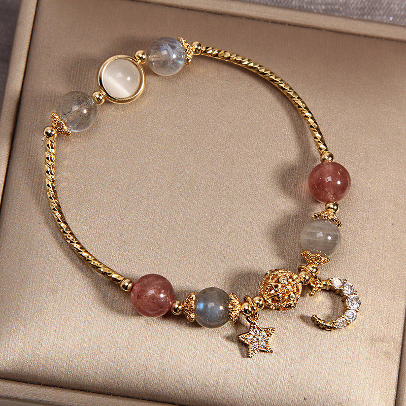 Pulsera de cuentas de labradorita y cuarzo fresa — dije de luna y estrella