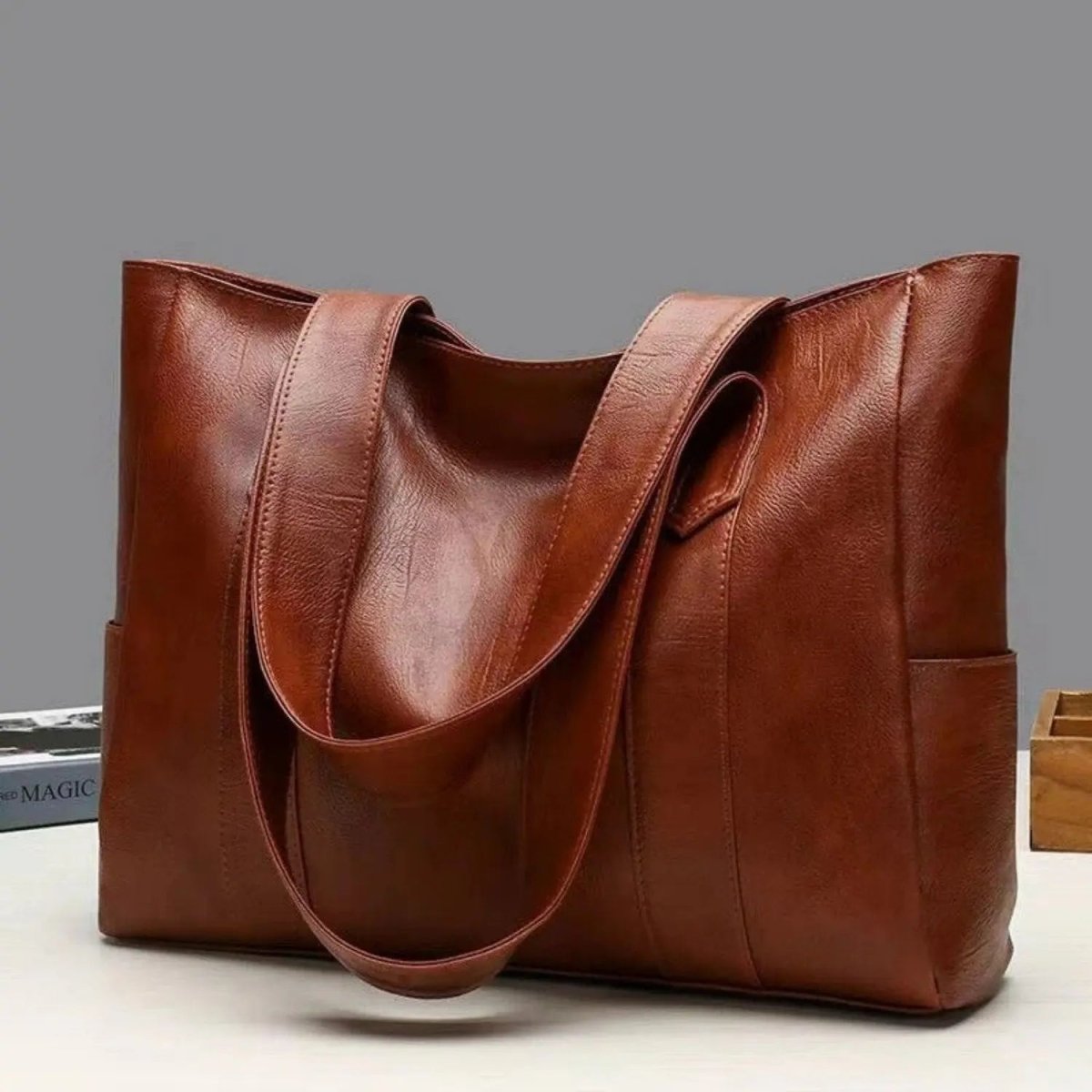 Elegante borsa a spalla in pelle dallo stile rétro e dalla superficie liscia | Euroselle