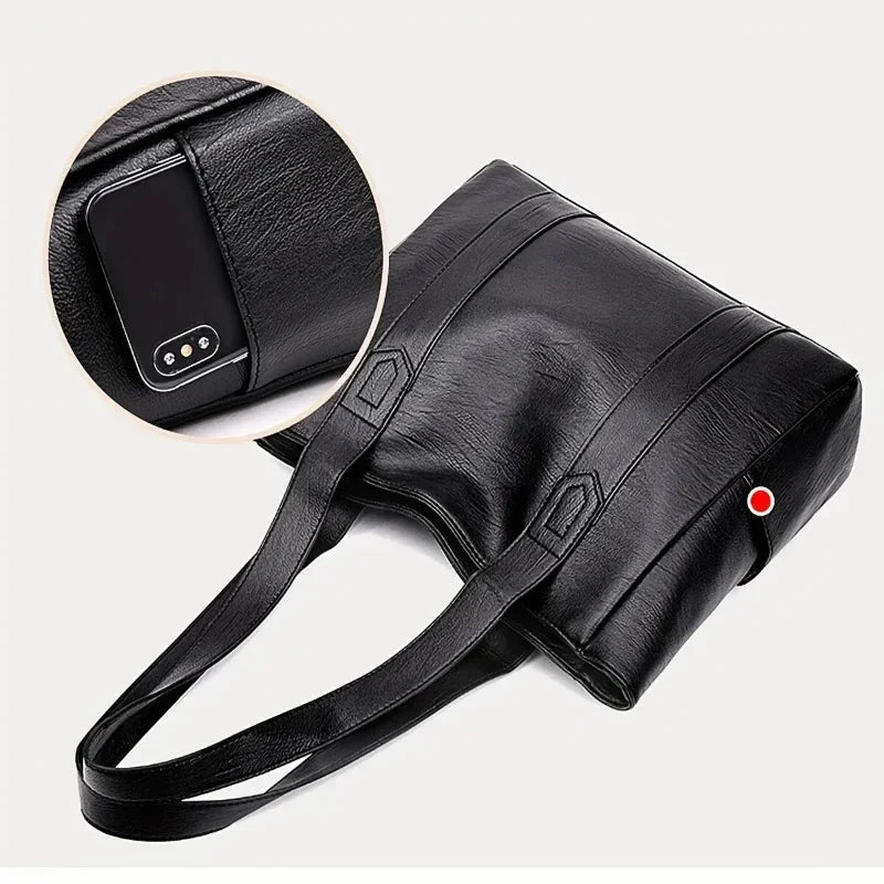 Elegante borsa a spalla in pelle dallo stile rétro e dalla superficie liscia | Euroselle