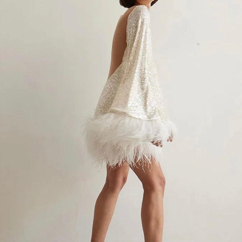 Mini fitted dress for women with sequin hem and feathers | Euroselle