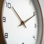 NORDICTIMBER – Modern Solid Wood Wall Clock in Brown & Cream | Euroselle