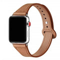 Smal rem i koskinn för kvinnor till Apple Watch — justerbart fjärilsspänne